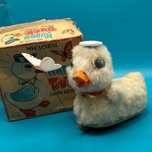 Rare Vintage Mechanical Happy Duck Toy - Chasing Butterfly